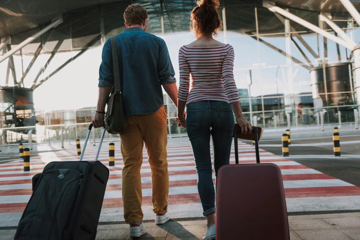 Couple reviewing spouse visa documents together